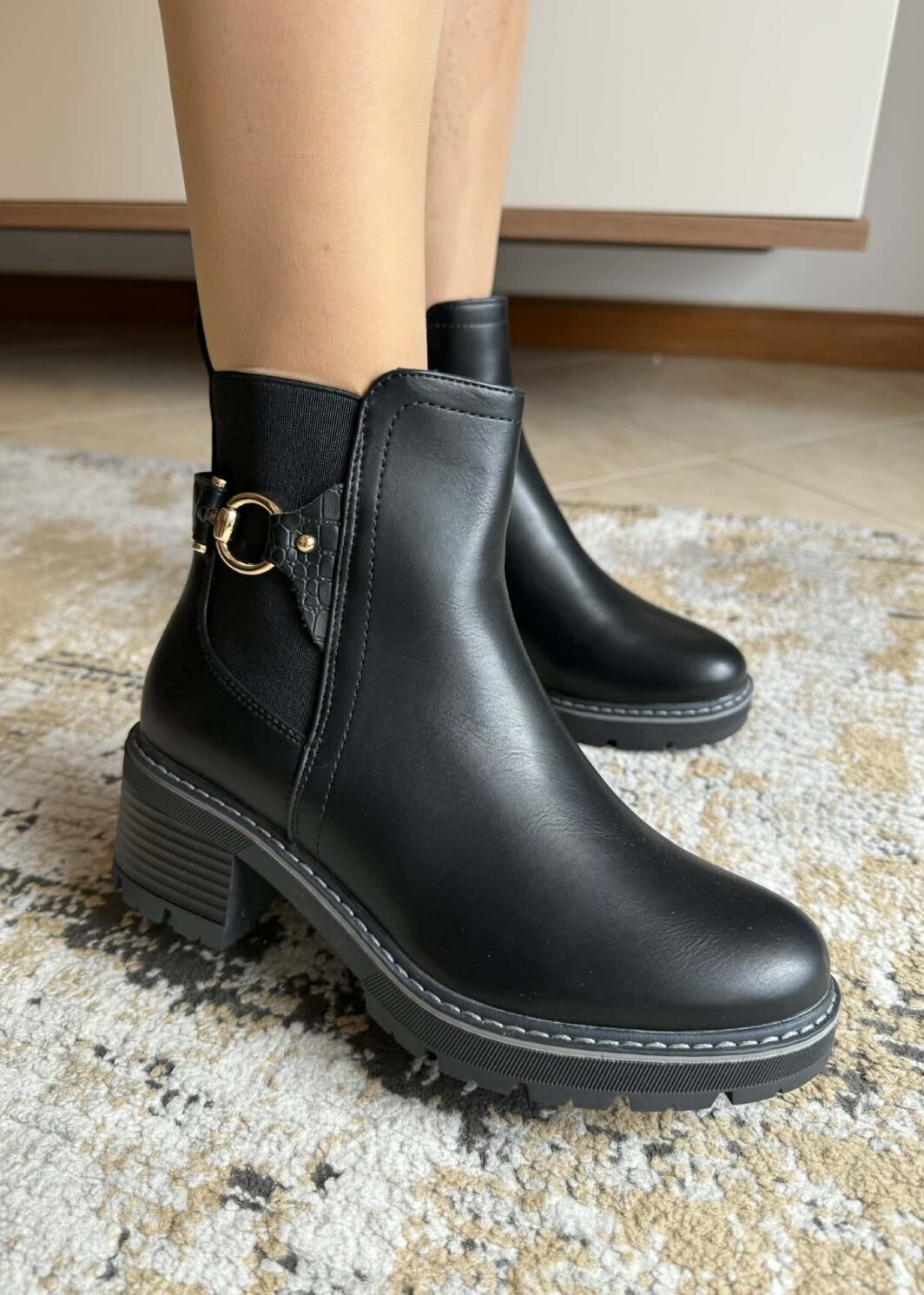 Botim Feebit.er Preto